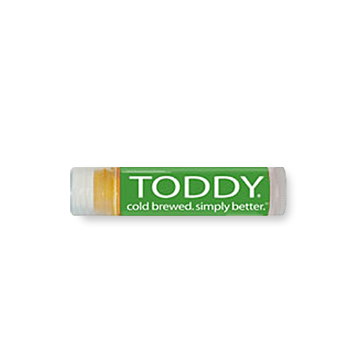 close up shot of Toddy merchandise spf lip balm in coffee flavor